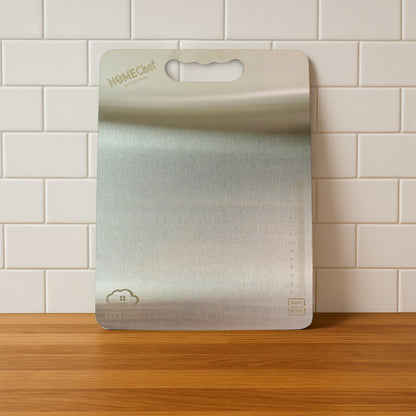 Stainless steel cutting board by Wukusy, 229mm x 330mm, ideal for home and kitchen food prep.