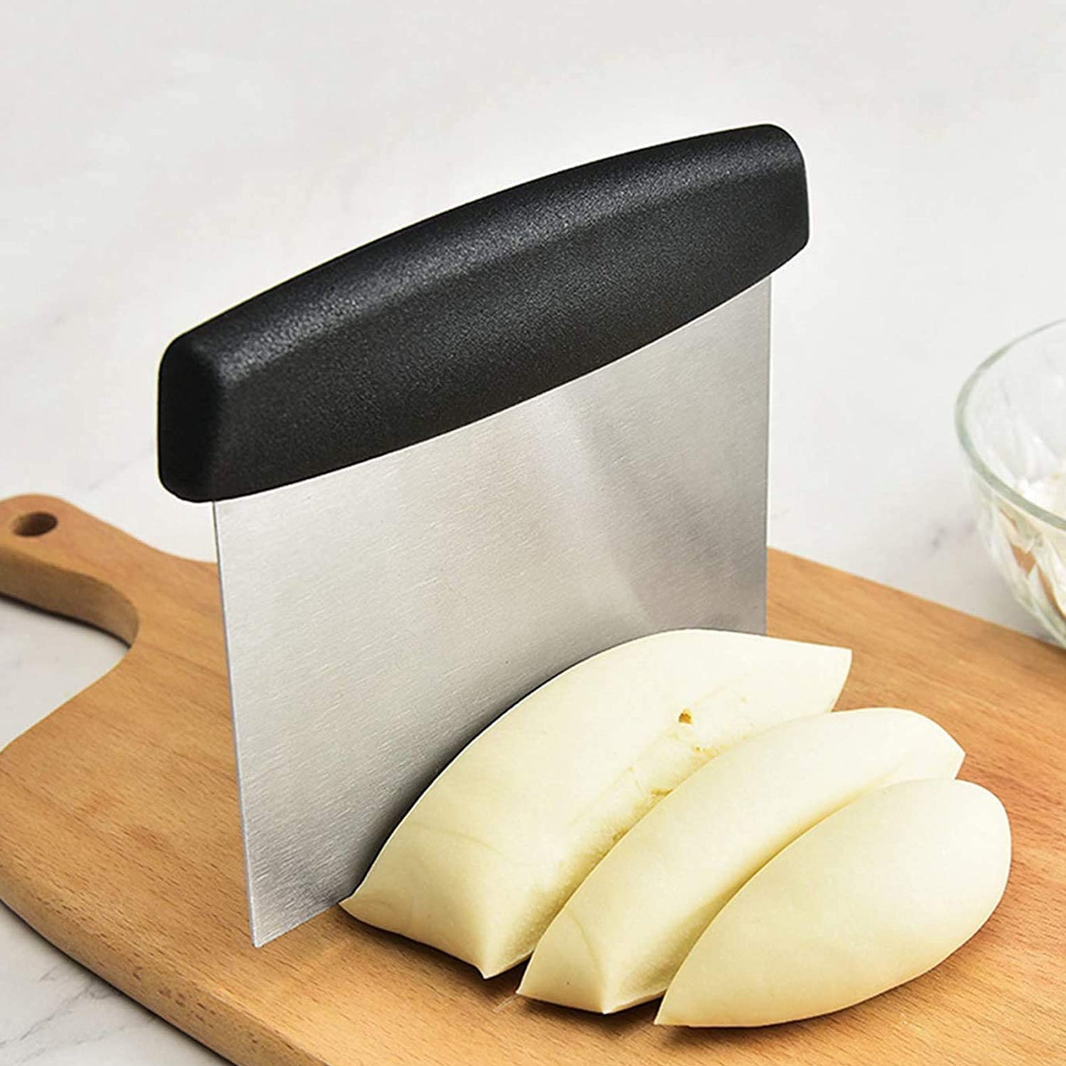 Wukusy premium stainless steel dough scraper for home and kitchen use, featuring a sturdy handle and wide blade for baking tasks.