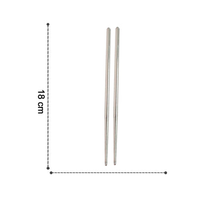 Set of two Wukusy premium stainless steel reusable chopsticks, sleek and durable for home and kitchen use.