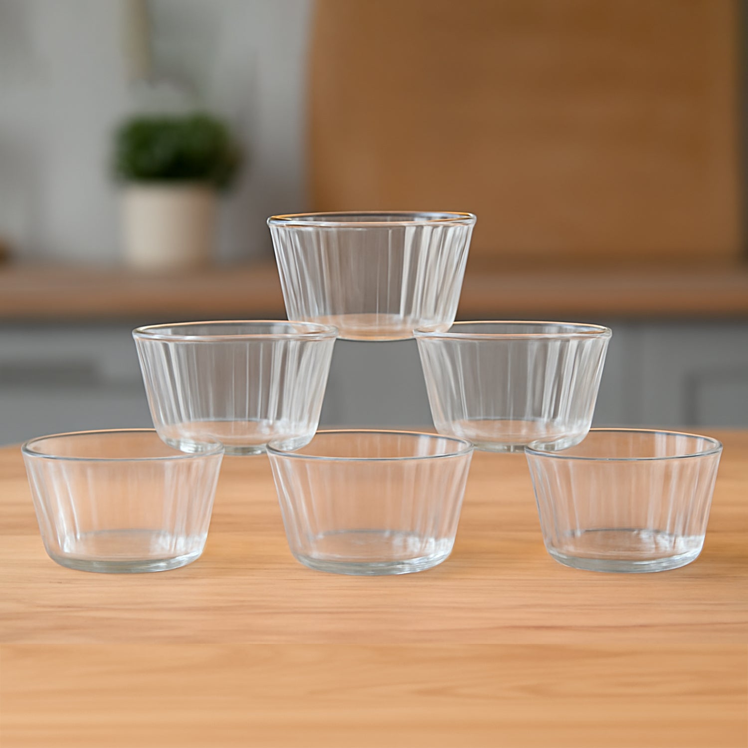 Six transparent plastic dessert bowls from Wukusy, perfect for serving desserts and snacks in a stylish home and kitchen setting.
