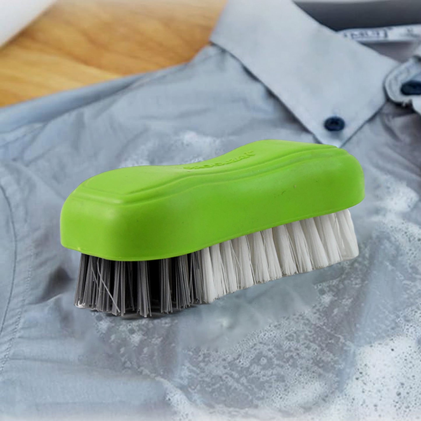 Wukusy Pro Clean multi-purpose cloth washing brush with plastic handle, ideal for kitchen cleaning tasks.