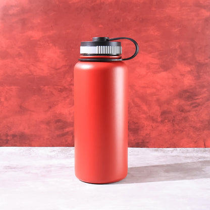 Red stainless steel Wukusy double wall vacuum-insulated 1000ml water bottle for home and kitchen use.