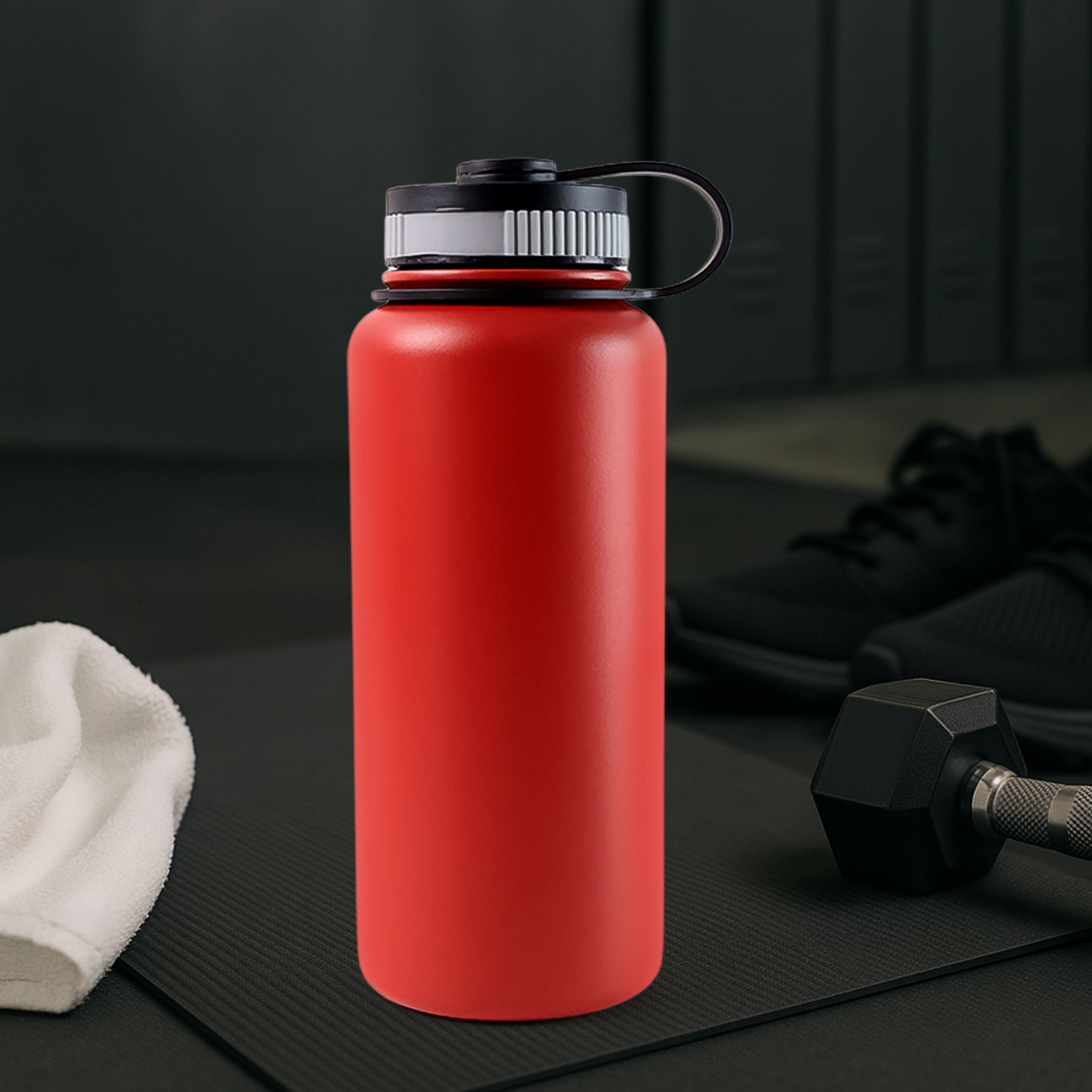 Red stainless steel Wukusy 1000ml double wall vacuum-insulated water bottle for hot and cold drinks, in a home and kitchen setting.