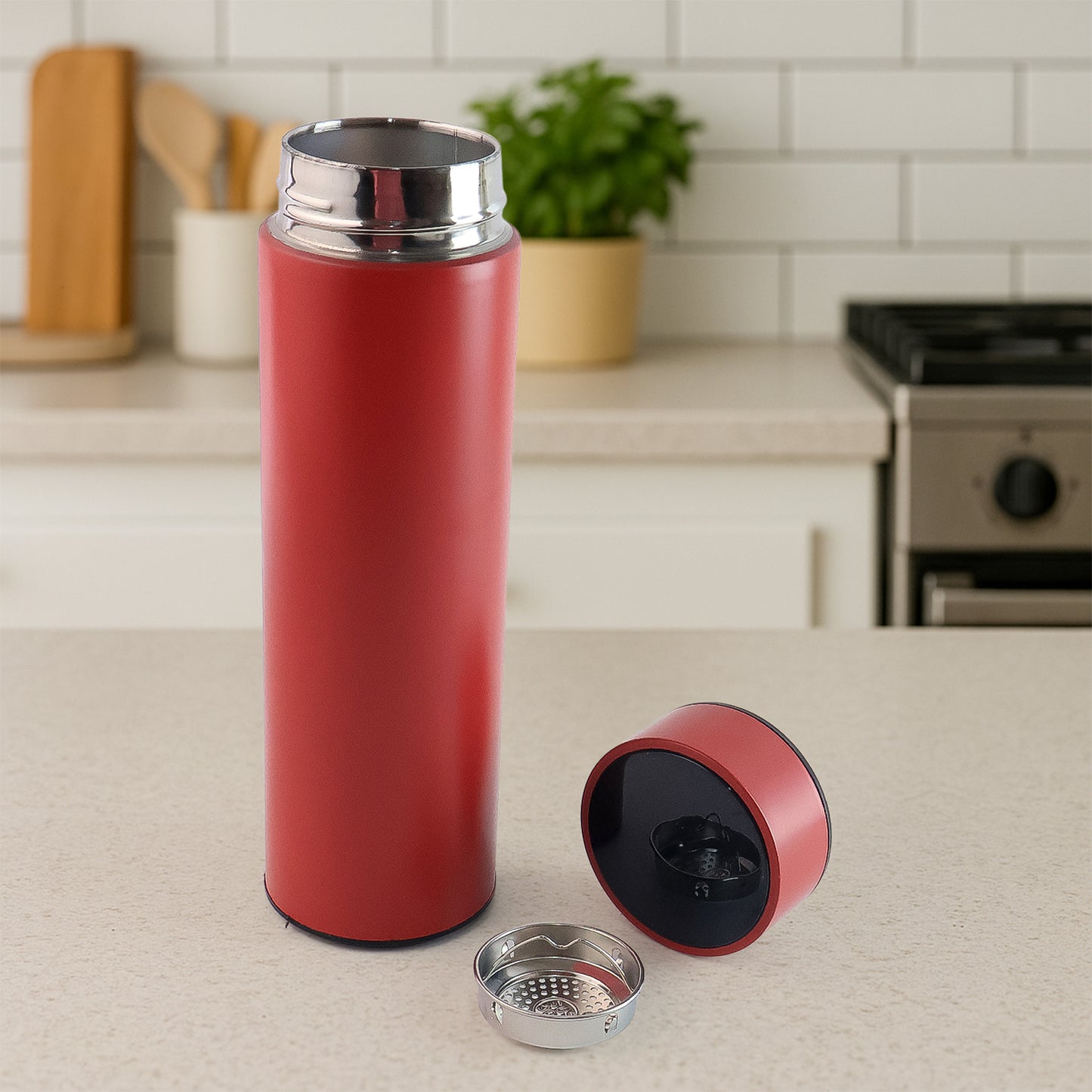 Red vacuum-insulated water bottle by Wukusy, 500ml, durable stainless steel, perfect for keeping drinks hot or cold.