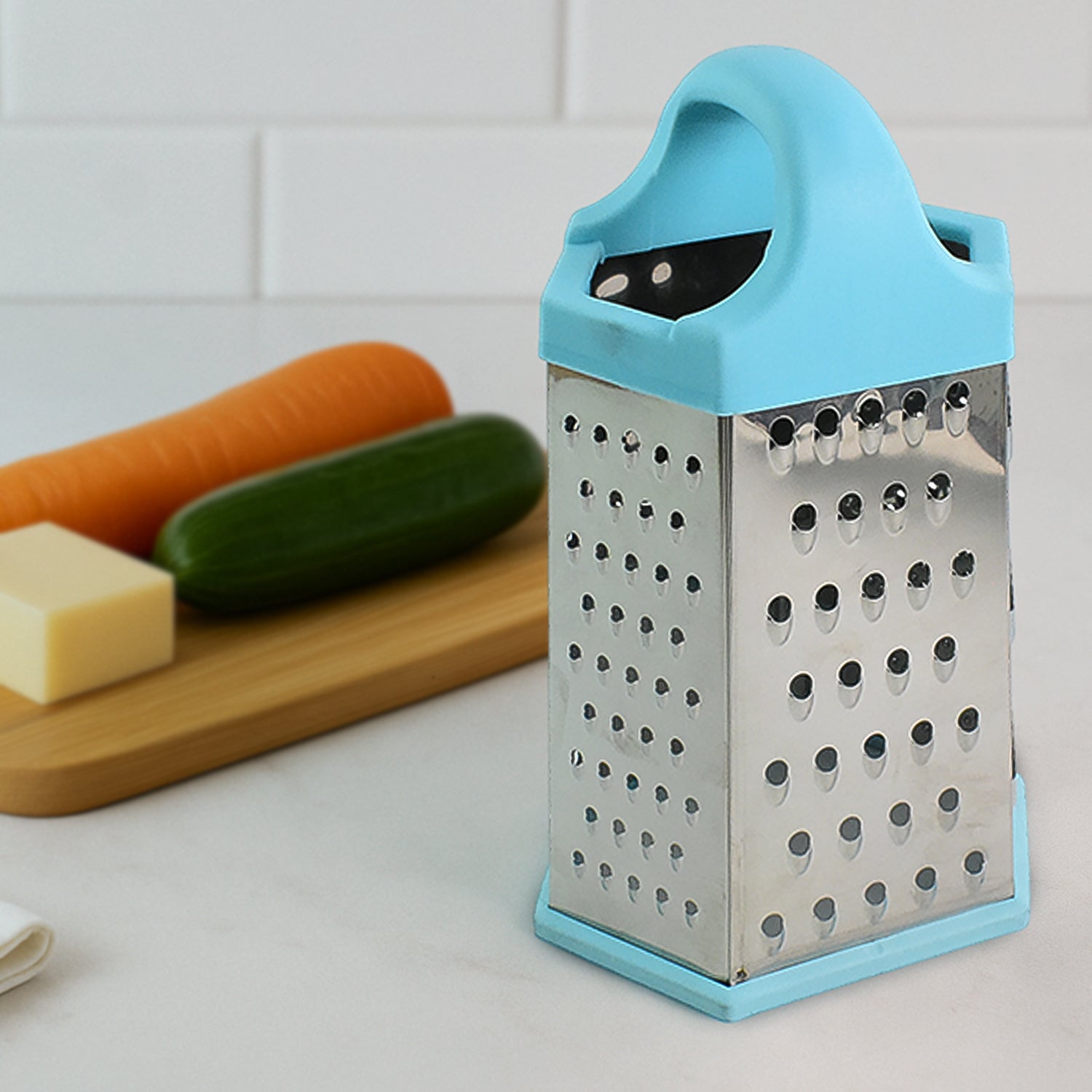 Wukusy Ritu Heavy-duty 7-in-1 Multipurpose Stainless Steel Hexagonal Grater for kitchen use, showing its various grating surfaces.