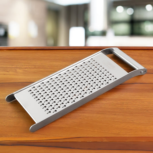 Wukusy Ritu premium stainless steel handheld grater and slicer for kitchen prep, with a handle and multiple grating surfaces.