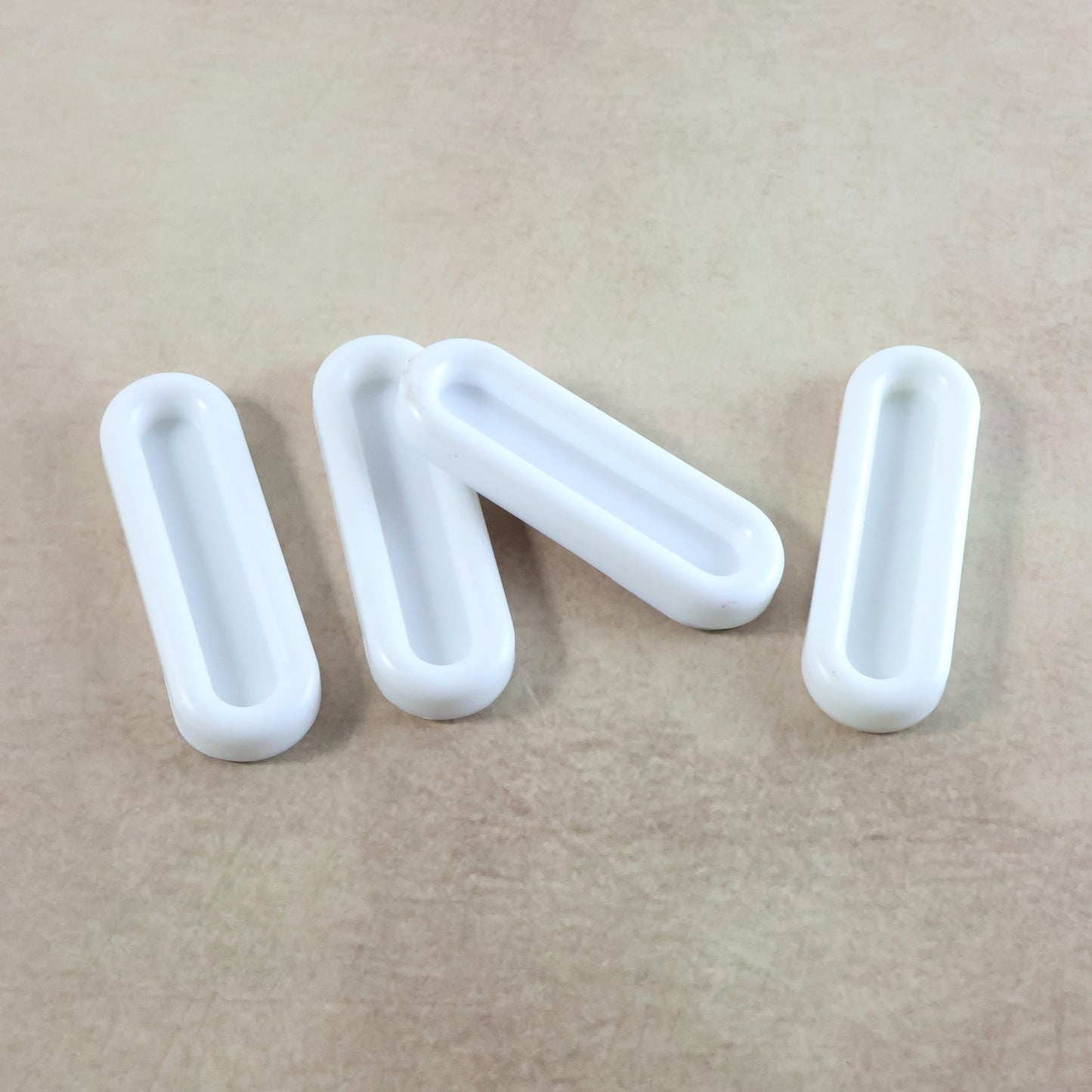 Set of four Wukusy Self Stick Push Pull Helpers for easier opening of doors and drawers in home and kitchen use.