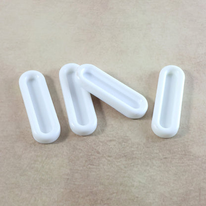 Set of four Wukusy Self Stick Push Pull Helpers for easier opening of doors and drawers in home and kitchen use.
