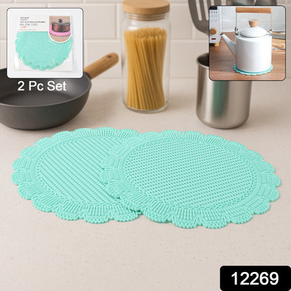 Wukusy silicone round heat resistant mat set with two durable, flexible mats for kitchen cooking and hot item protection.