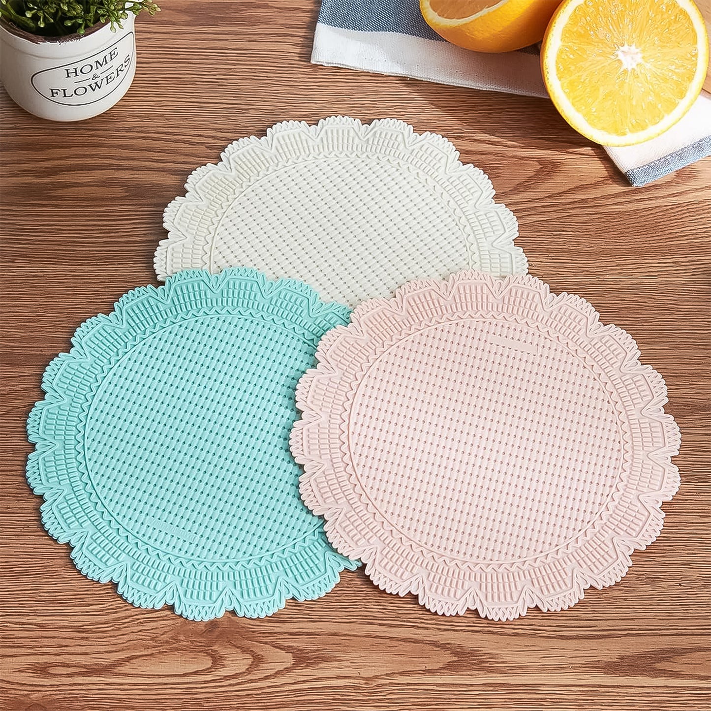 Wukusy silicone round heat resistant mats, set of two, ideal for kitchen use, protect surfaces from hot cookware.