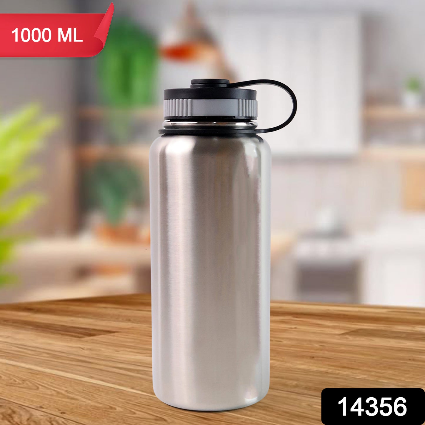 Silver Wukusy stainless steel double wall vacuum-insulated water bottle, 1000 ml, for hot or cold drinks, in a home and kitchen setting.