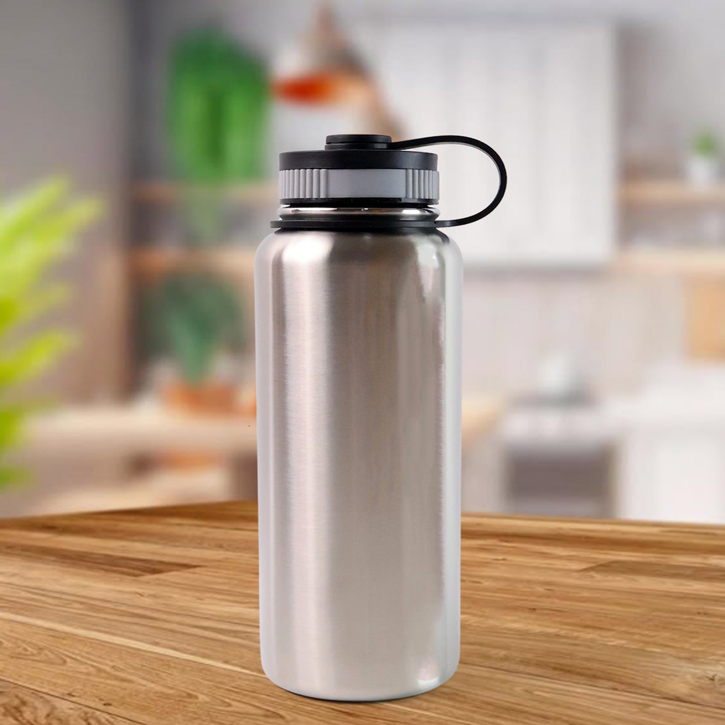 Silver Wukusy stainless steel double wall vacuum-insulated water bottle, 1000 ml, for keeping drinks hot or cold.