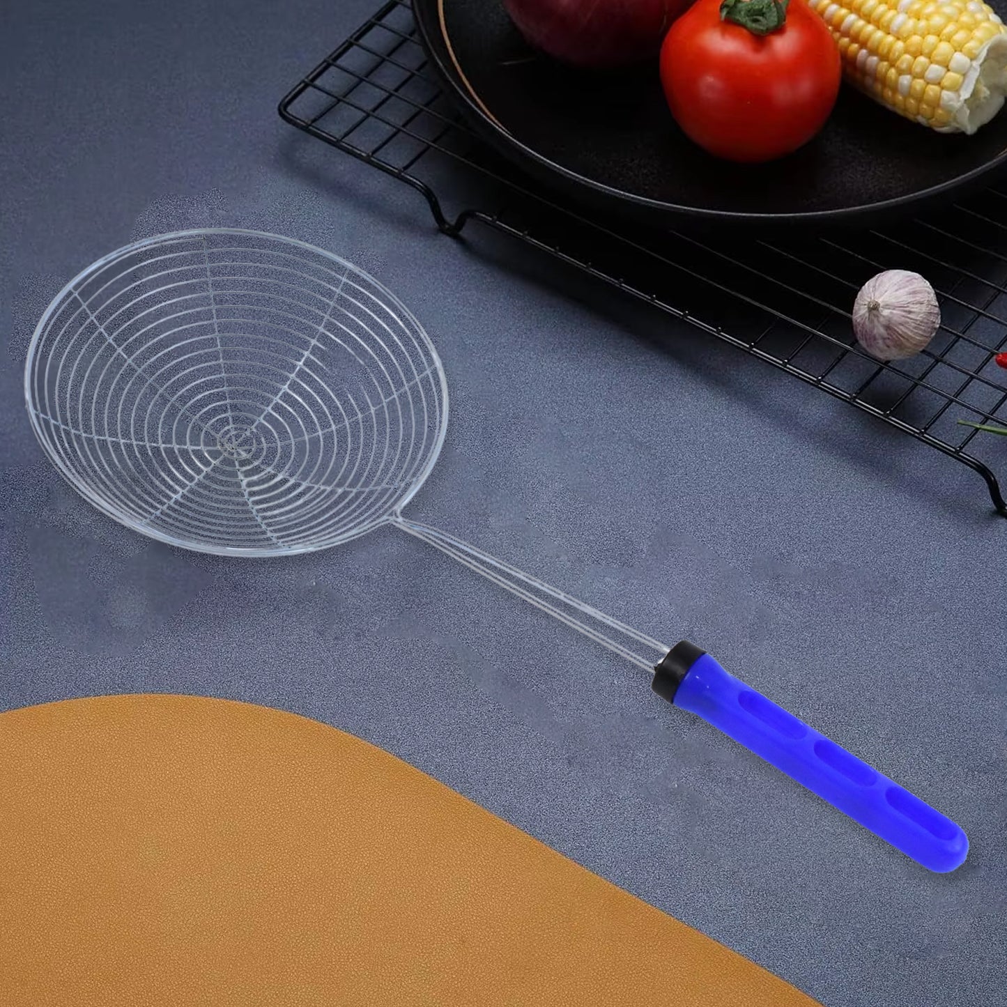 Large stainless steel deep fry strainer by Wukusy, designed for home kitchen use, with fine mesh for draining fried foods.