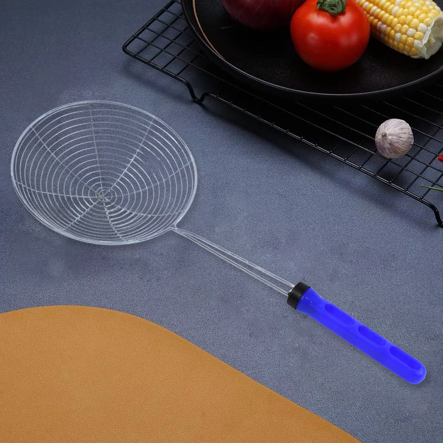 Large stainless steel deep fry strainer by Wukusy, designed for home kitchen use, with fine mesh for draining fried foods.