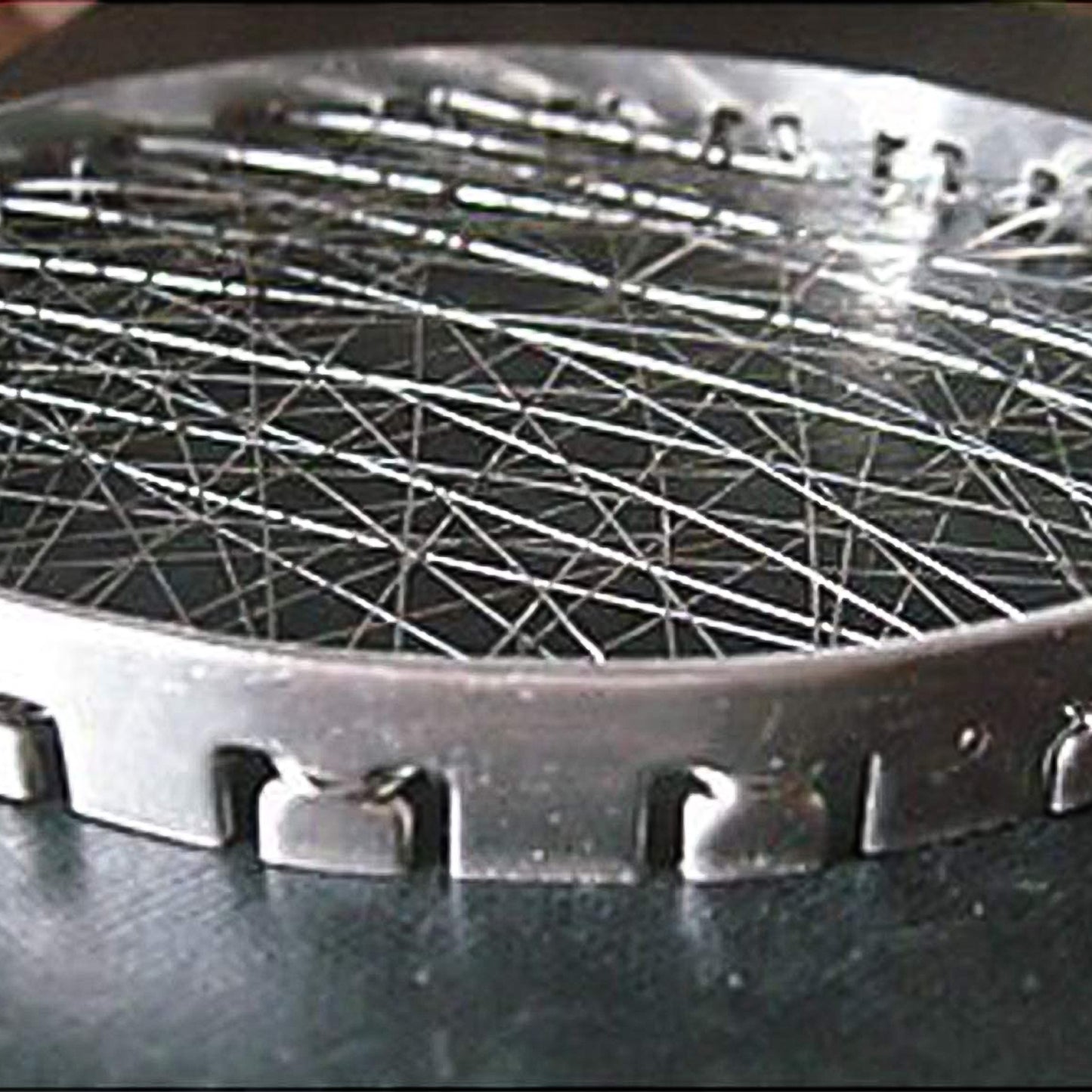 Stainless steel grill jalli chota tandoor by Wukusy, compact home kitchen tandoor with intricate grill pattern.