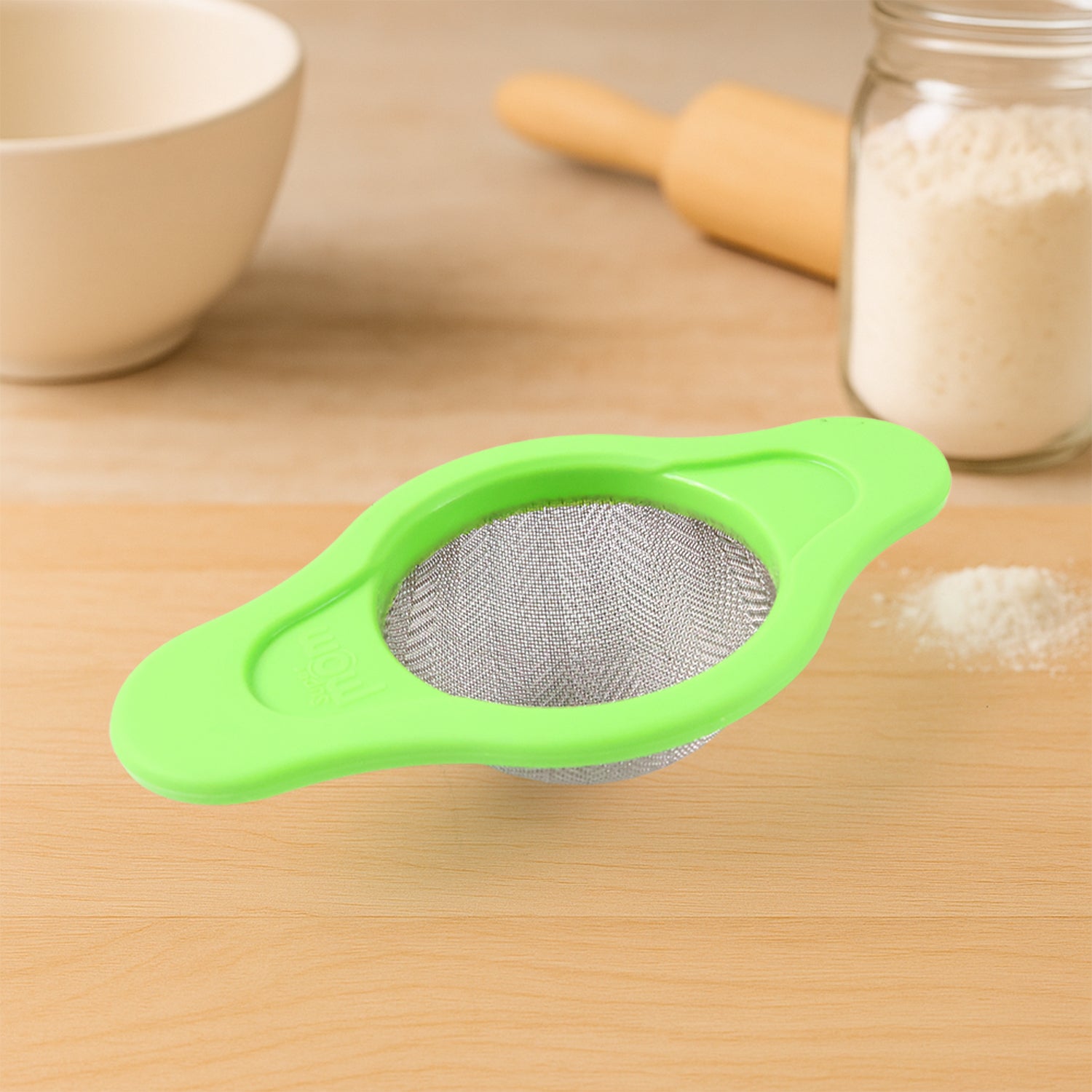 Stainless steel mesh strainer with dual handle plastic frame, ideal for kitchen filtering and straining tasks.