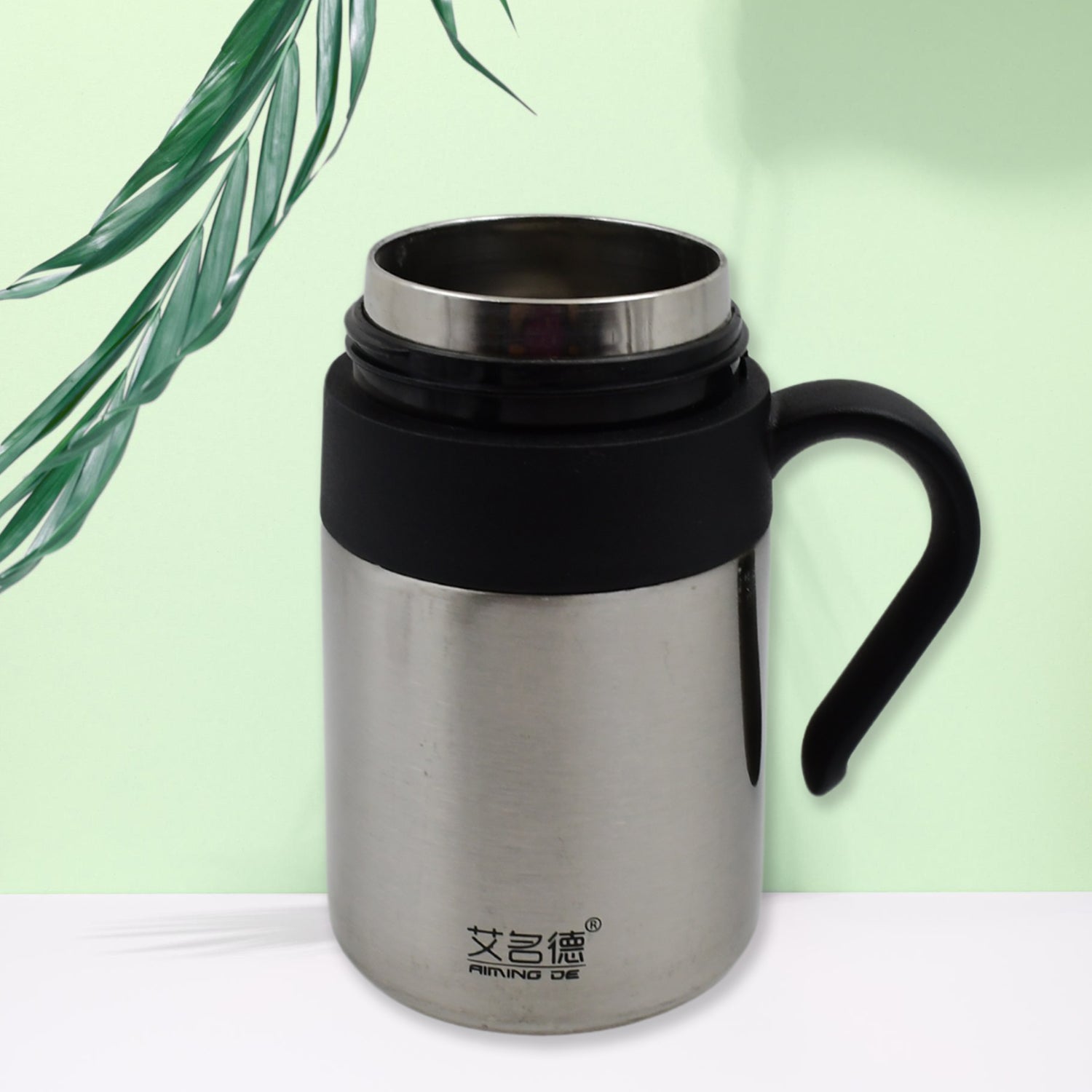 Wukusy stainless steel vacuum insulated mug with handle, 420 ml, small travel cup for hot and cold beverages.