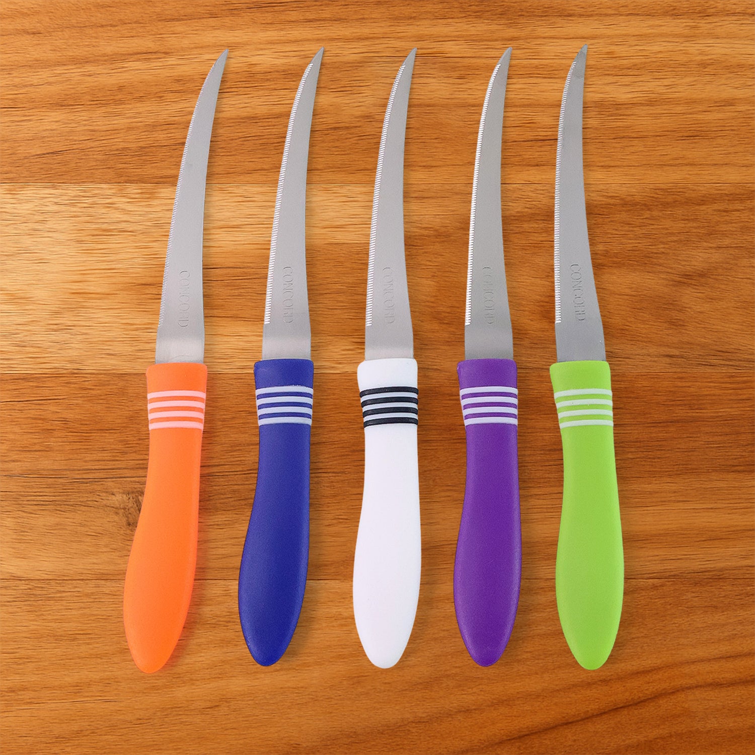 Wukusy 12-piece stainless steel multipurpose serrated knife set with various kitchen knives on a countertop.