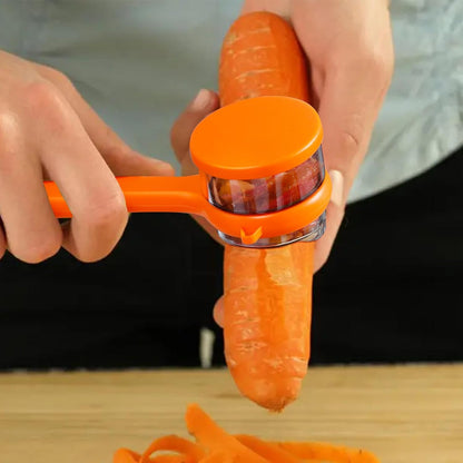 Wukusy stainless steel peeler with attached container for peeling and collecting produce, ideal for home and kitchen use.
