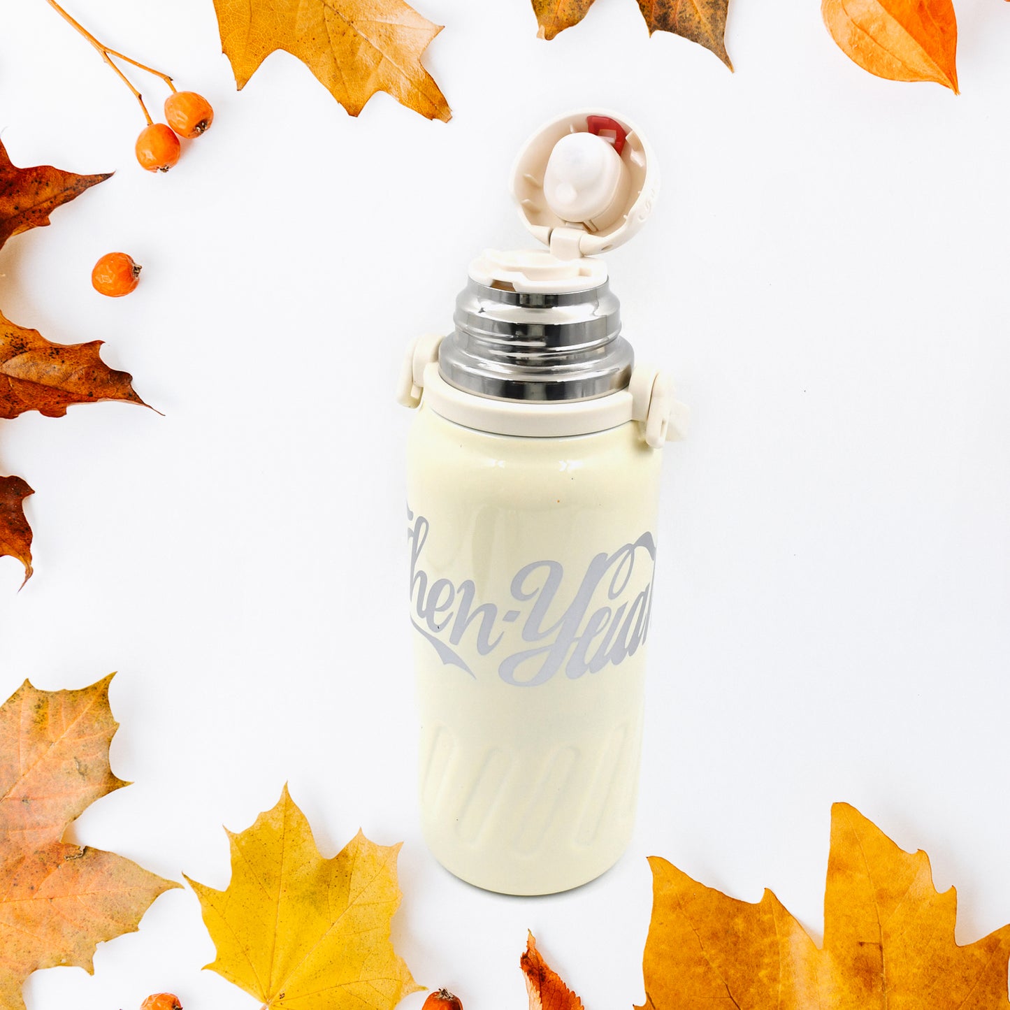 Wukusy stainless steel vacuum insulated water bottle with wide mouth, hanging strap, ideal for hot and cold drinks, 900-1200ml capacity.
