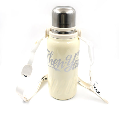 Wukusy stainless steel vacuum insulated water bottle with hanging strap, wide mouth, leak-proof design, suitable for hot and cold drinks.