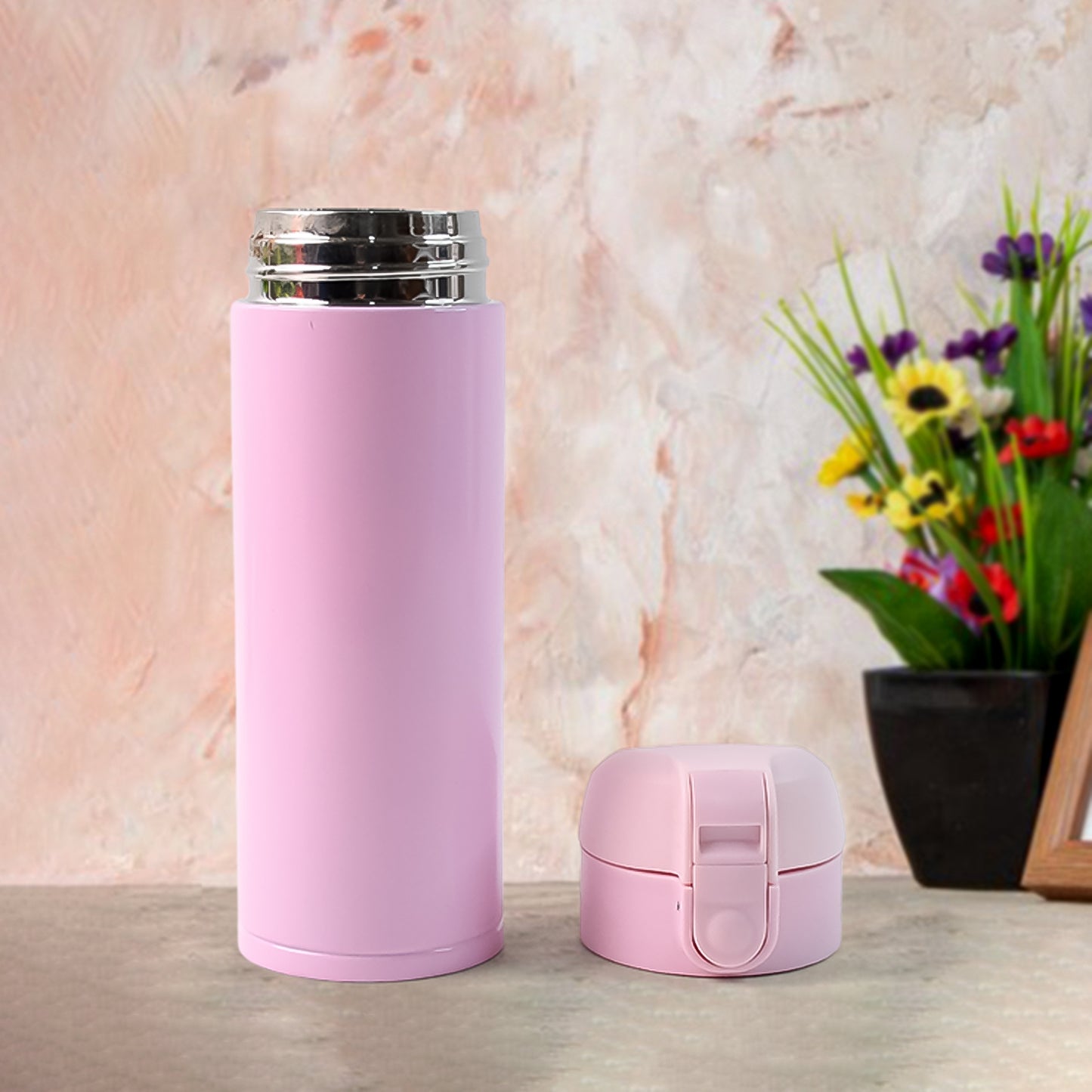 Stainless steel vacuum water bottle by Wukusy, 350ml capacity, designed for home and kitchen use, with a sleek silver finish.