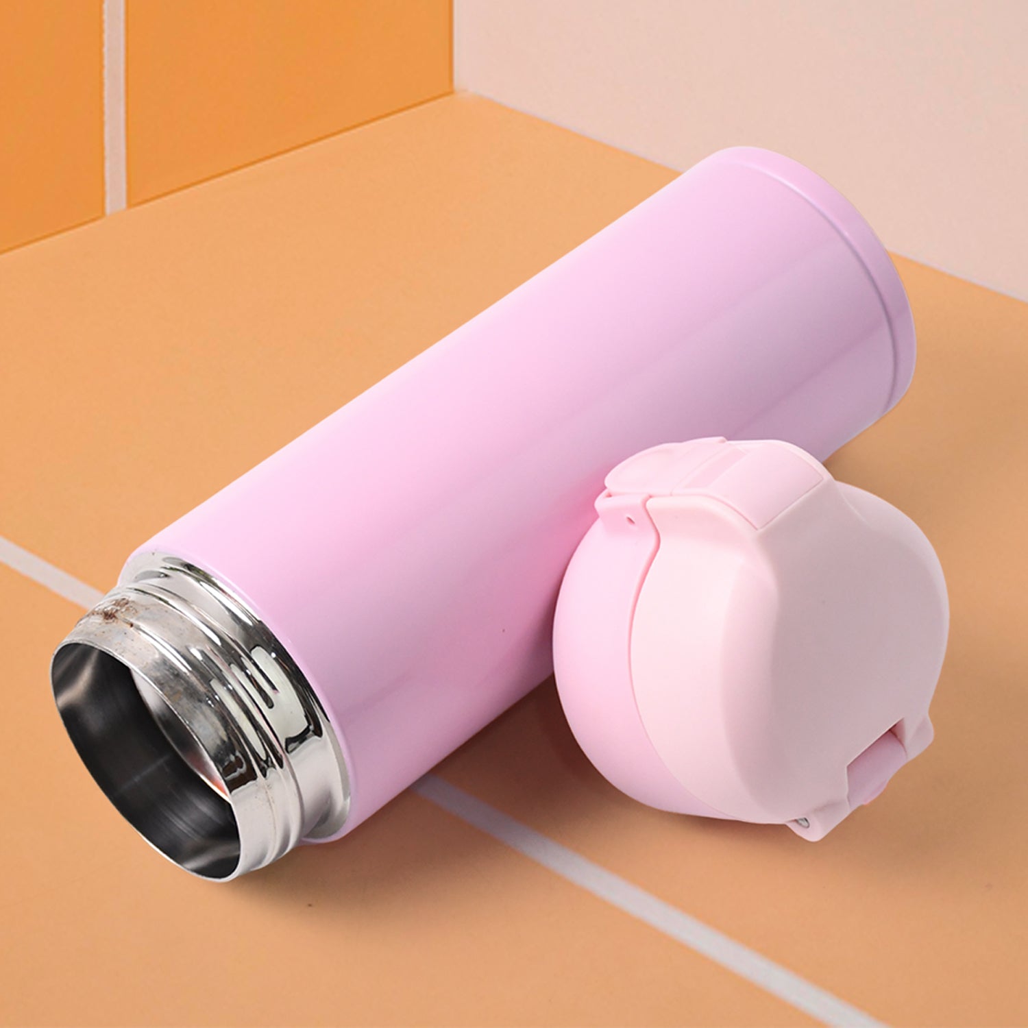 Stainless steel vacuum water bottle by Wukusy, 350ml capacity, designed for home and kitchen use, with a sleek, insulated container