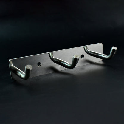 Stainless steel wall-mounted coat rack with three hooks, 14x3 inches, ideal for home and kitchen organization by Wukusy.