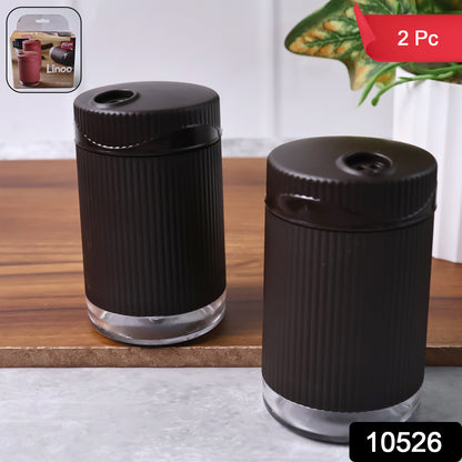 Wukusy Supermom Linoo salt and pepper dispenser set, 2-piece kitchen spice shakers with clear containers and black caps.