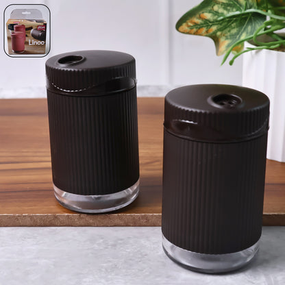 Wukusy Supermom Linoo salt and pepper dispenser set, 2-piece kitchen accessories with sleek design and easy-to-use pour spouts.
