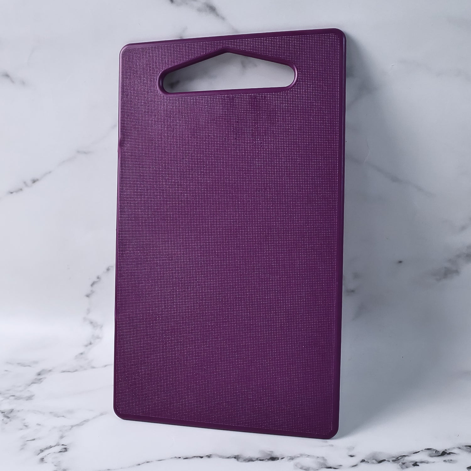 Wukusy Supermom Little Master unbreakable cutting board for kitchen food prep, durable and lightweight kitchen tool.
