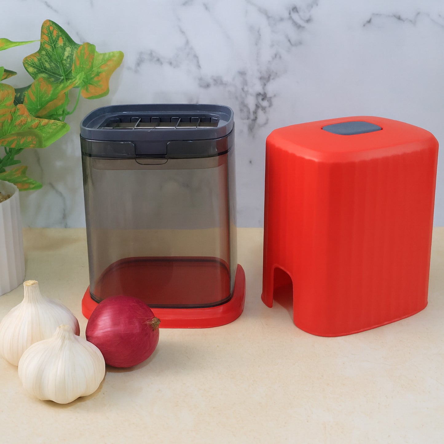 Wukusy Supermom multipurpose onion and garlic vegetable chopper for kitchen use, featuring stainless steel blades and compact design.