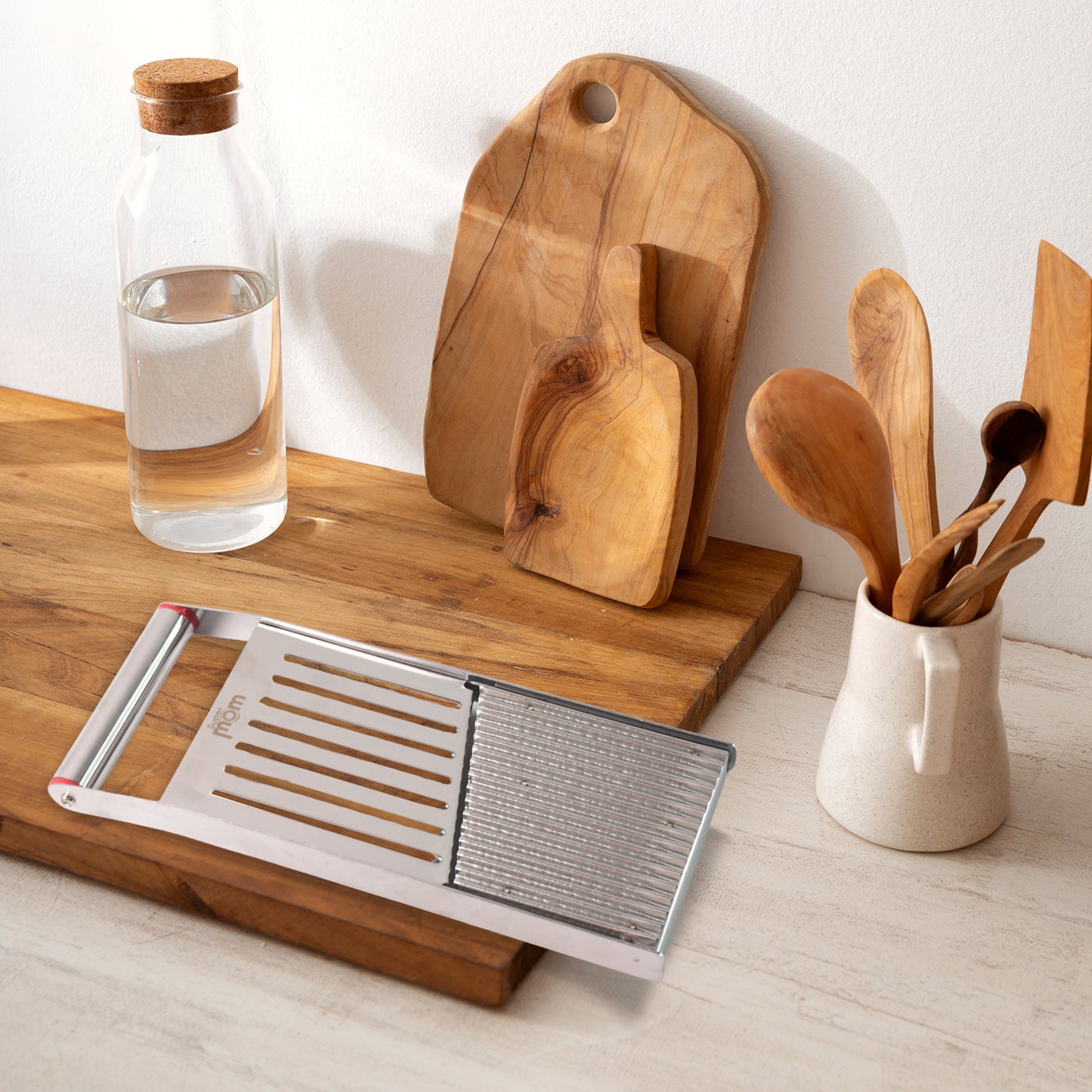 Supermom stainless steel vegetable and fruit slicer by Wukusy, designed for efficient home kitchen slicing.
