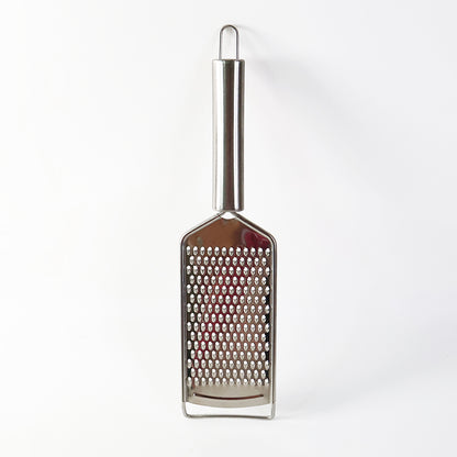 Wukusy Supermom stainless steel carrot grater for kitchen use, featuring a durable design and multiple grating surfaces.