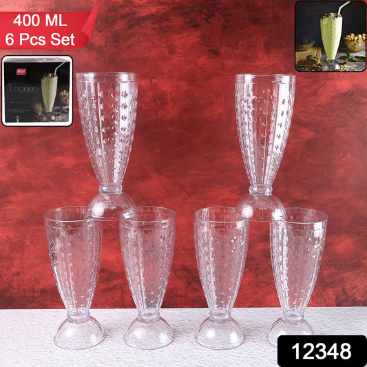 Six transparent plastic milkshake glasses by Wukusy, 400ml capacity, arranged on a kitchen countertop.