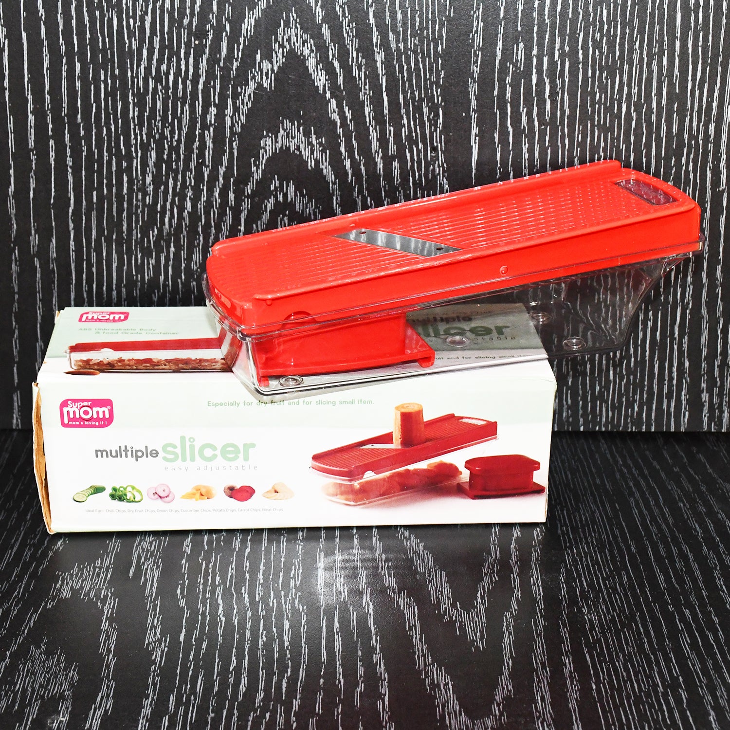 Wukusy Supermom vegetable and dry fruit slicer, a versatile kitchen tool with multiple blades for easy food preparation.