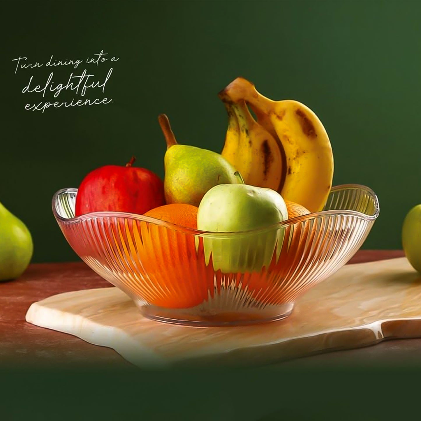 Wukusy Supermom Wringo plastic fruit storage basket for kitchen, with a round design and ventilation holes for fresh fruit storage.