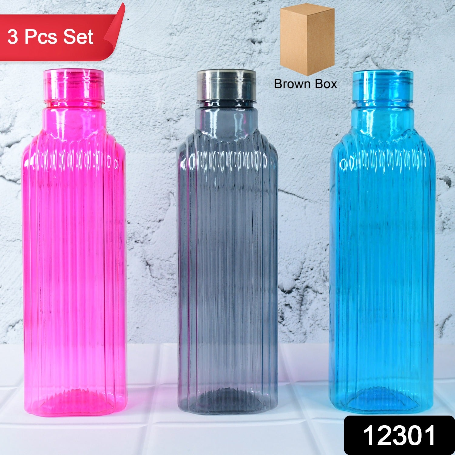Set of three transparent fridge water bottles from Wukusy, designed for home and kitchen use.