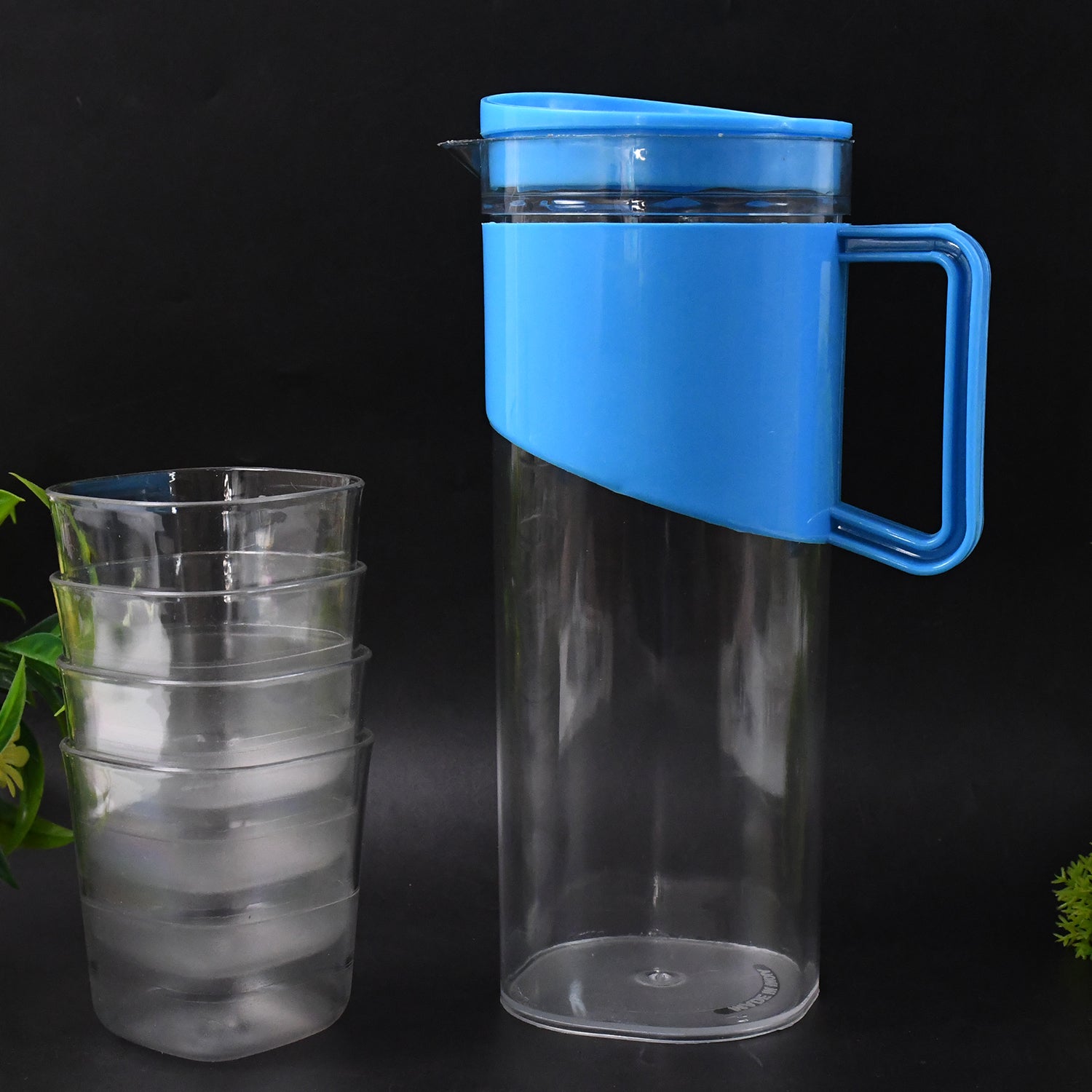 Set of four transparent Wukusy 2000ml plastic jugs with elegant handles, ideal for kitchen and home use.