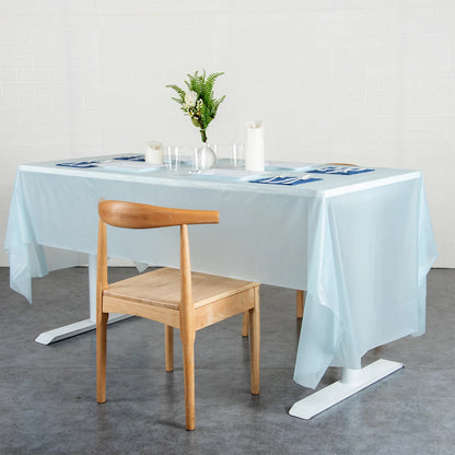 Waterproof disposable plastic table cover by Wukusy, 137x183 cm, ideal for home and kitchen use, protecting surfaces from spills.