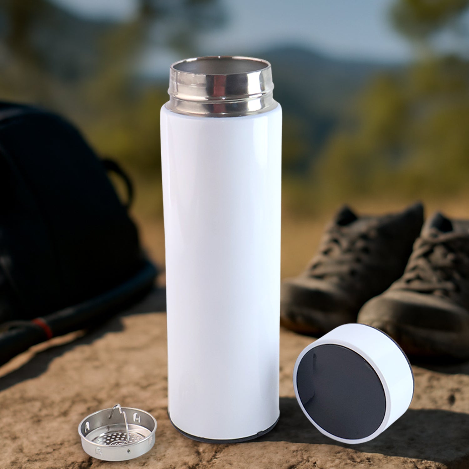 White vacuum insulated water bottle by Wukusy, 500ml capacity, sleek design for keeping drinks hot or cold.