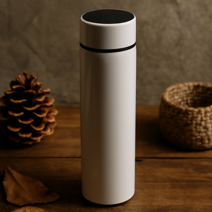 White vacuum insulated water bottle by Wukusy, 500ml, made of durable stainless steel for hot and cold beverages.