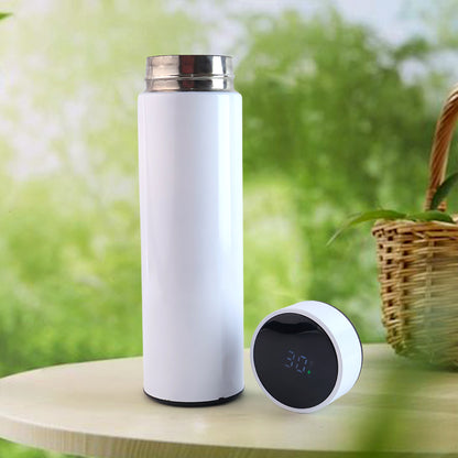 White Wukusy vacuum insulated water bottle, 500ml, with a sleek design and secure lid, ideal for keeping beverages hot or cold.