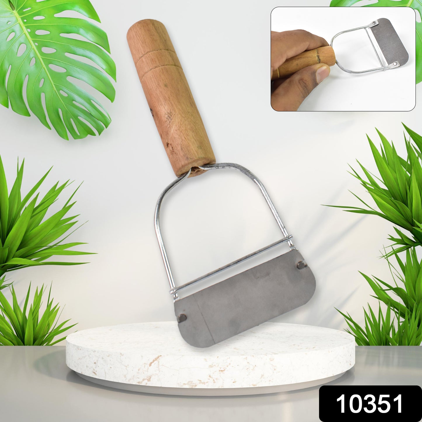 Wukusy wooden handle metal vegetable cutter and peeler slicer for kitchen use, featuring a sturdy design and ergonomic grip.