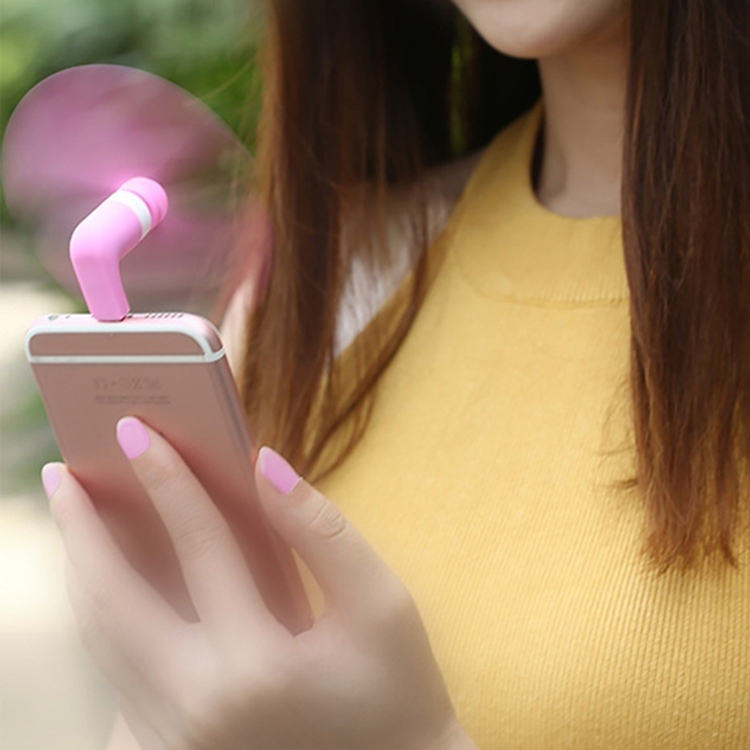 Wukusy kids mini USB fan providing cool air instantly, portable and compact for kids' personal cooling on the go.