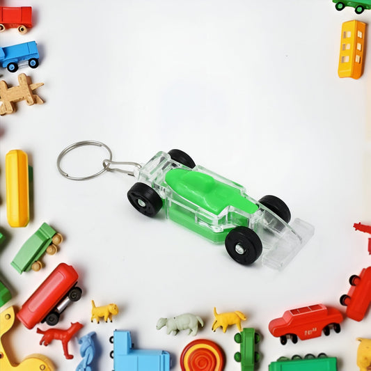 Kids' Wukusy car-shaped keychain with on/off button and flashing LED light, featuring a colorful car design.