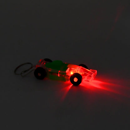 Kids' cars-shaped keychain with on/off button and LED flashing light by Wukusy, featuring colorful car design and light feature.