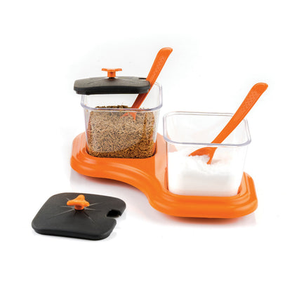 Wukusy kitchen tool set with two plastic dining table stands, pickle jars, spice trays, spoons, and storage containers for condiments.
