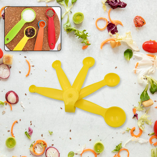 Set of five Wukusy plastic measuring spoons for precise kitchen measurements, displayed in a close-up shot.