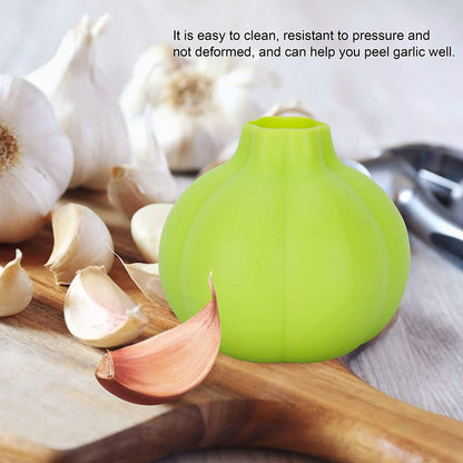 Wukusy 2205 silicone ginger and garlic manual peeler for easy peeling of ginger and garlic cloves in the kitchen.